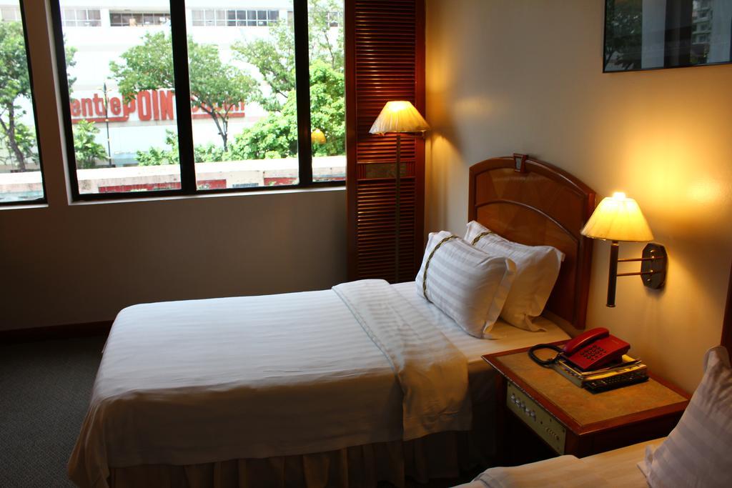 Hotel Deleeton Kota Kinabalu Quarto foto